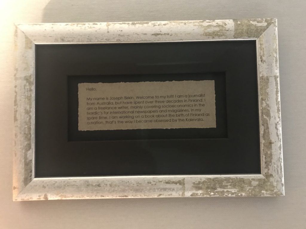 a picture frame with a piece of paper on it