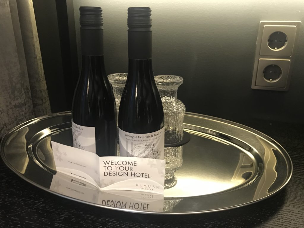 a tray with two bottles of wine on it