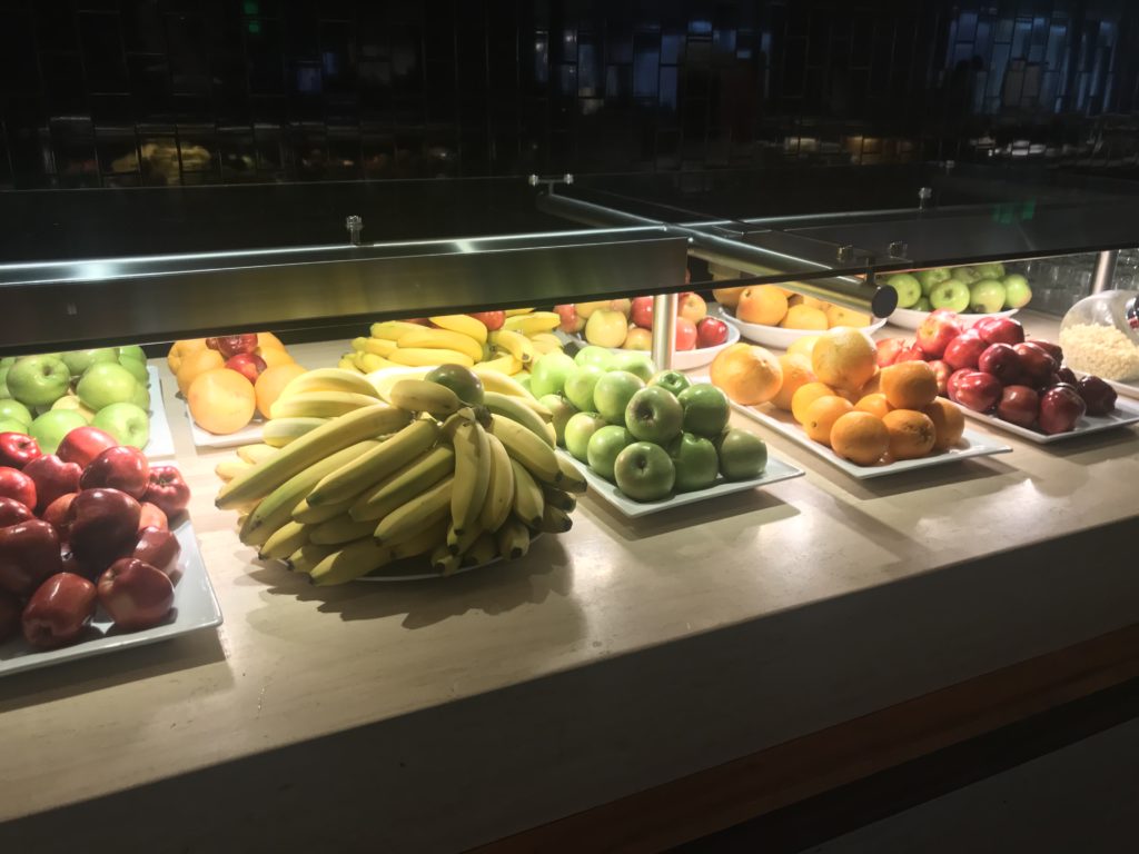 a display of fruits on a counter