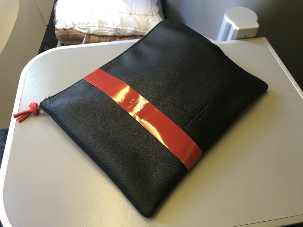 a black bag with a red stripe on it