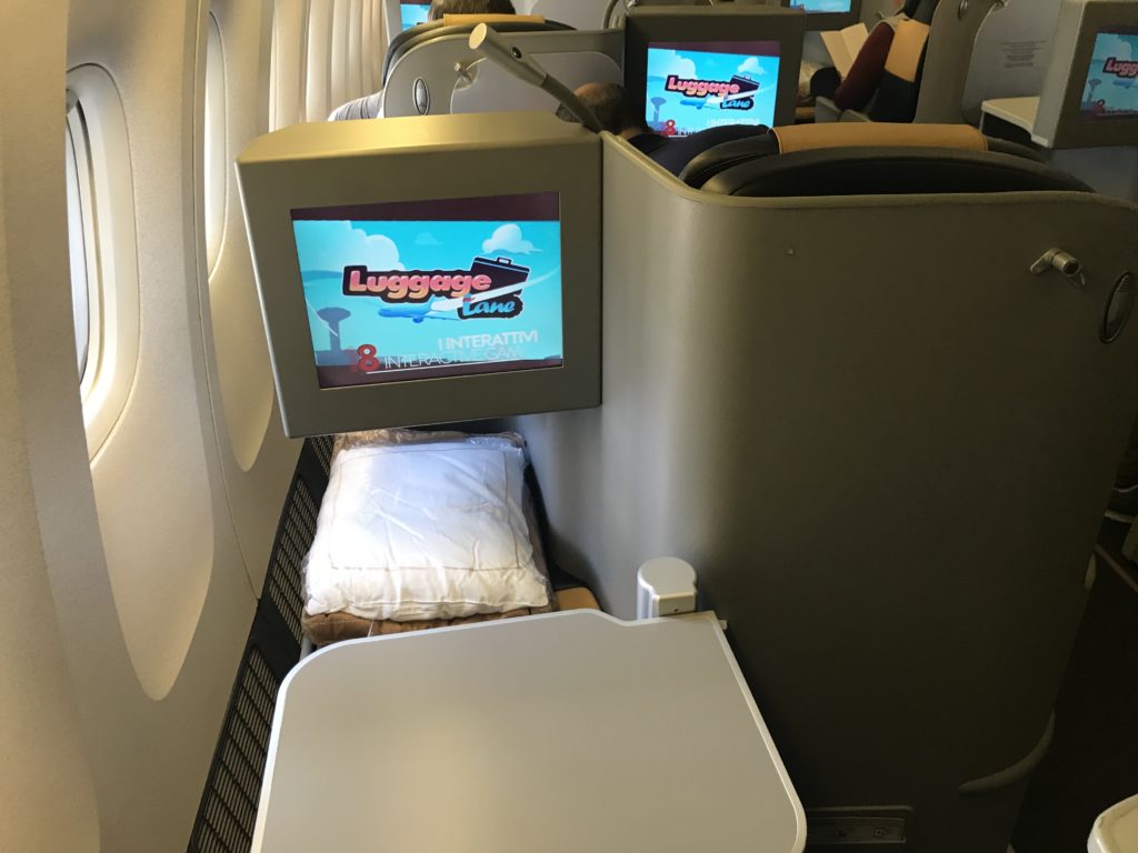 a tv screen on a plane