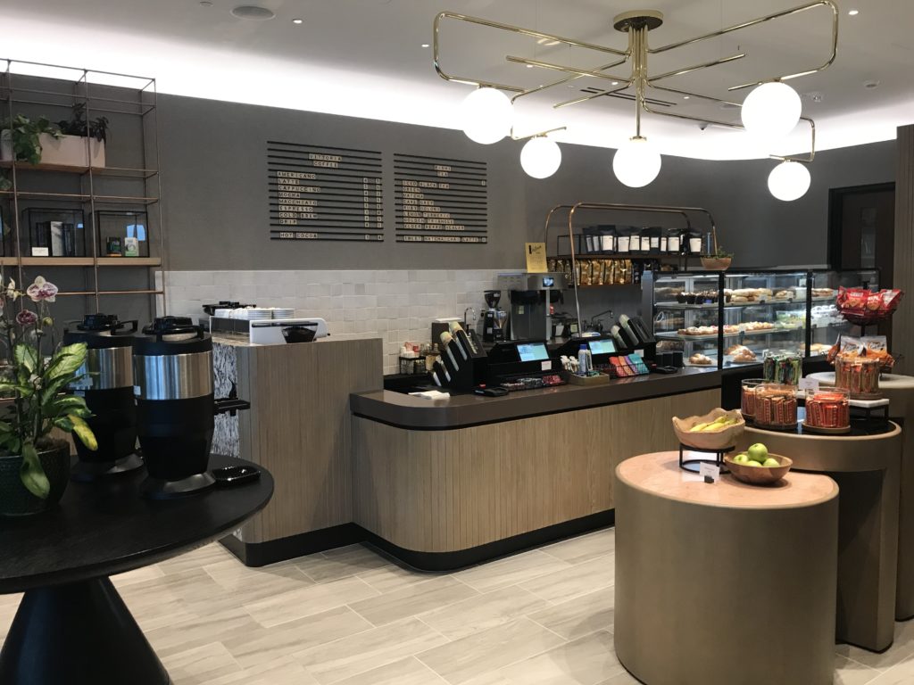a coffee shop with a counter and a coffee maker