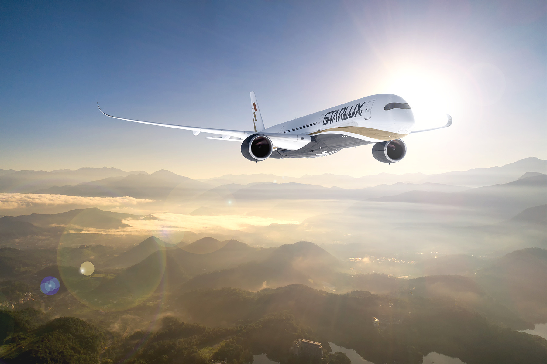 an airplane flying over the clouds