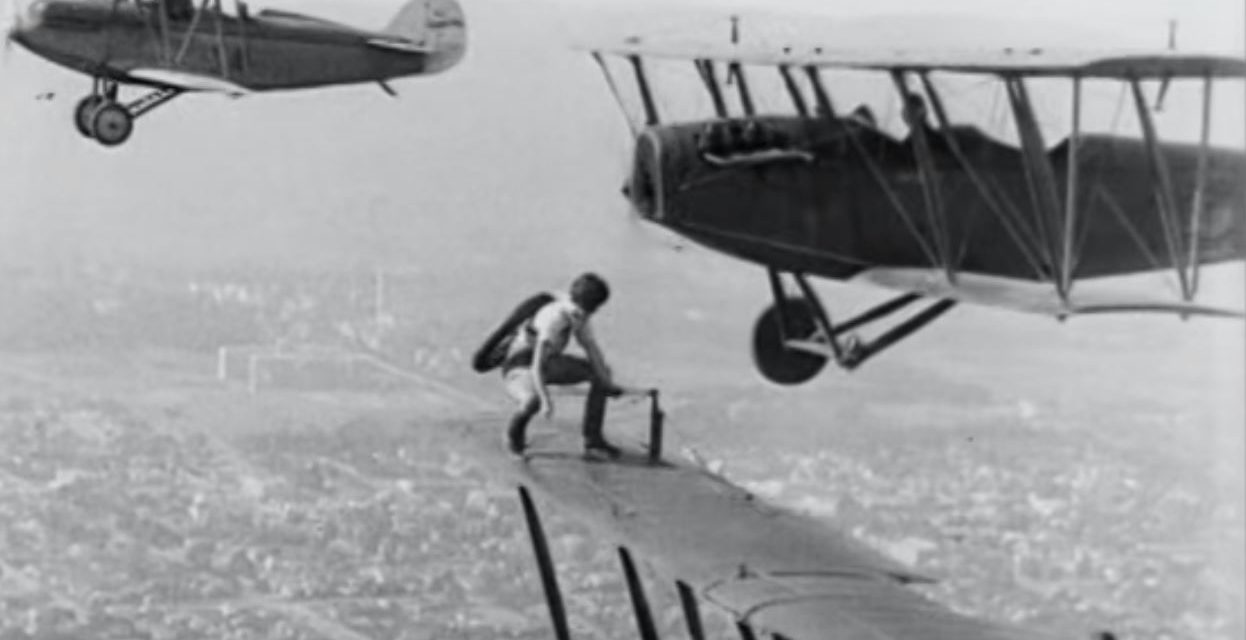 Check out this video of Gladys Ingle changing planes mid-air… with no safety equipment!