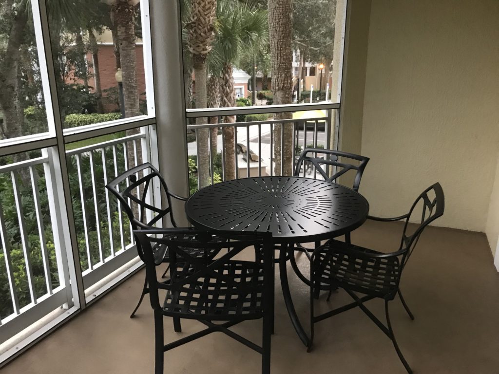 a table and chairs on a patio