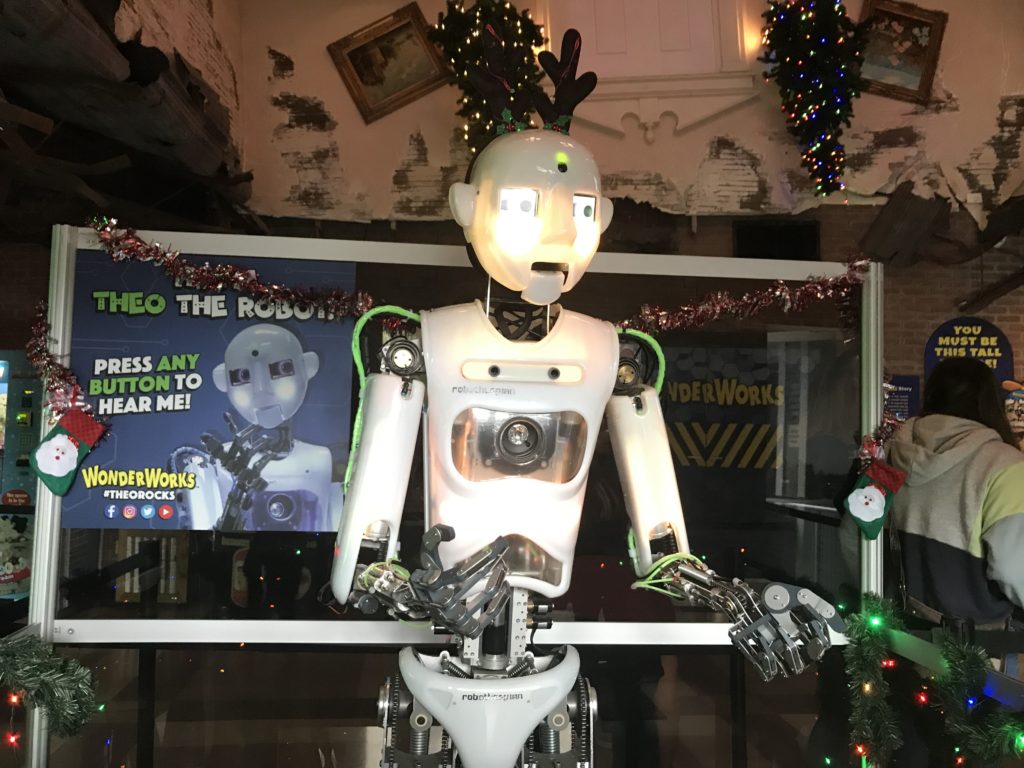 a robot standing in front of a window