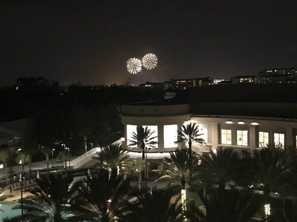 fireworks in the sky over a building