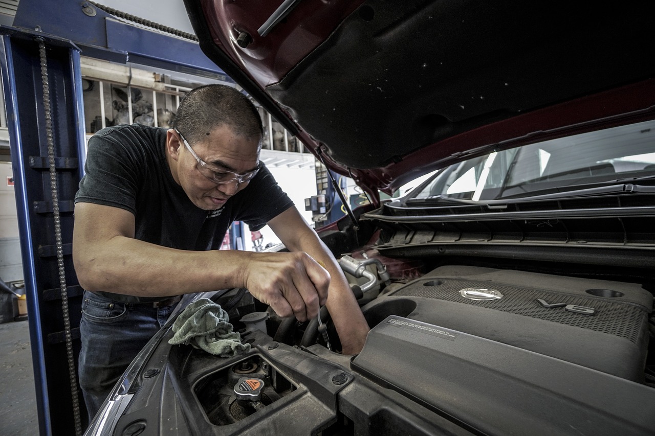 a man working on a car