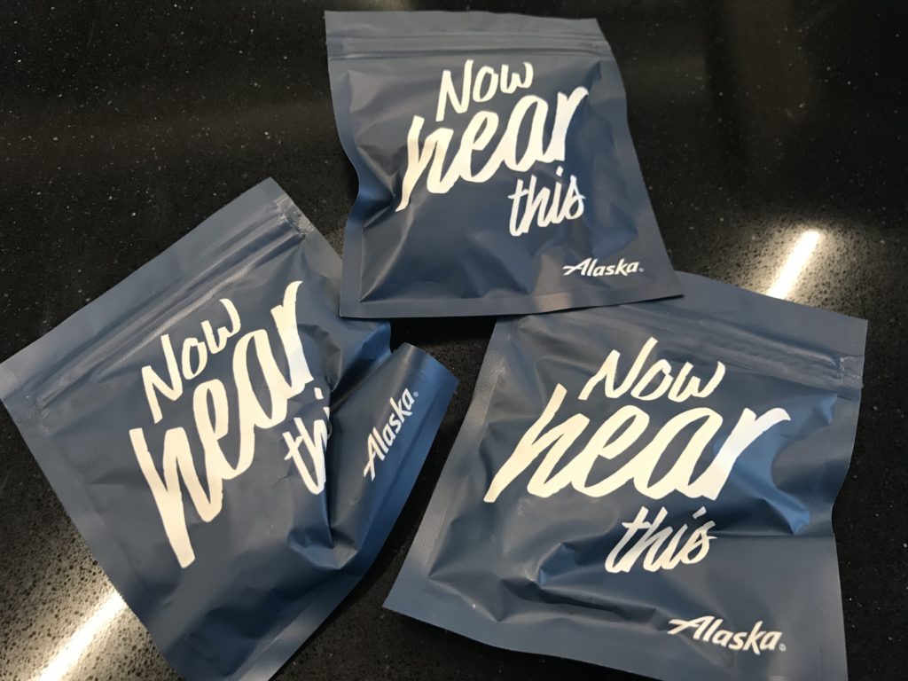 a group of blue bags with white text