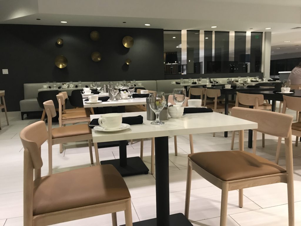 a restaurant with tables and chairs