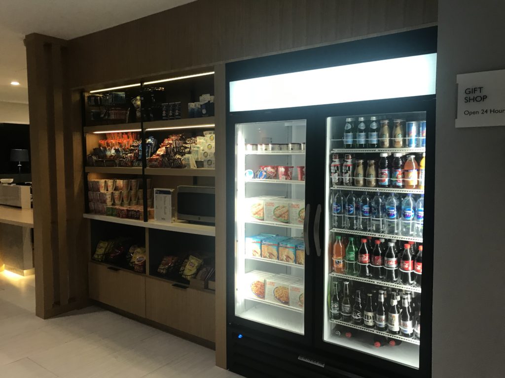 a refrigerator with drinks and snacks