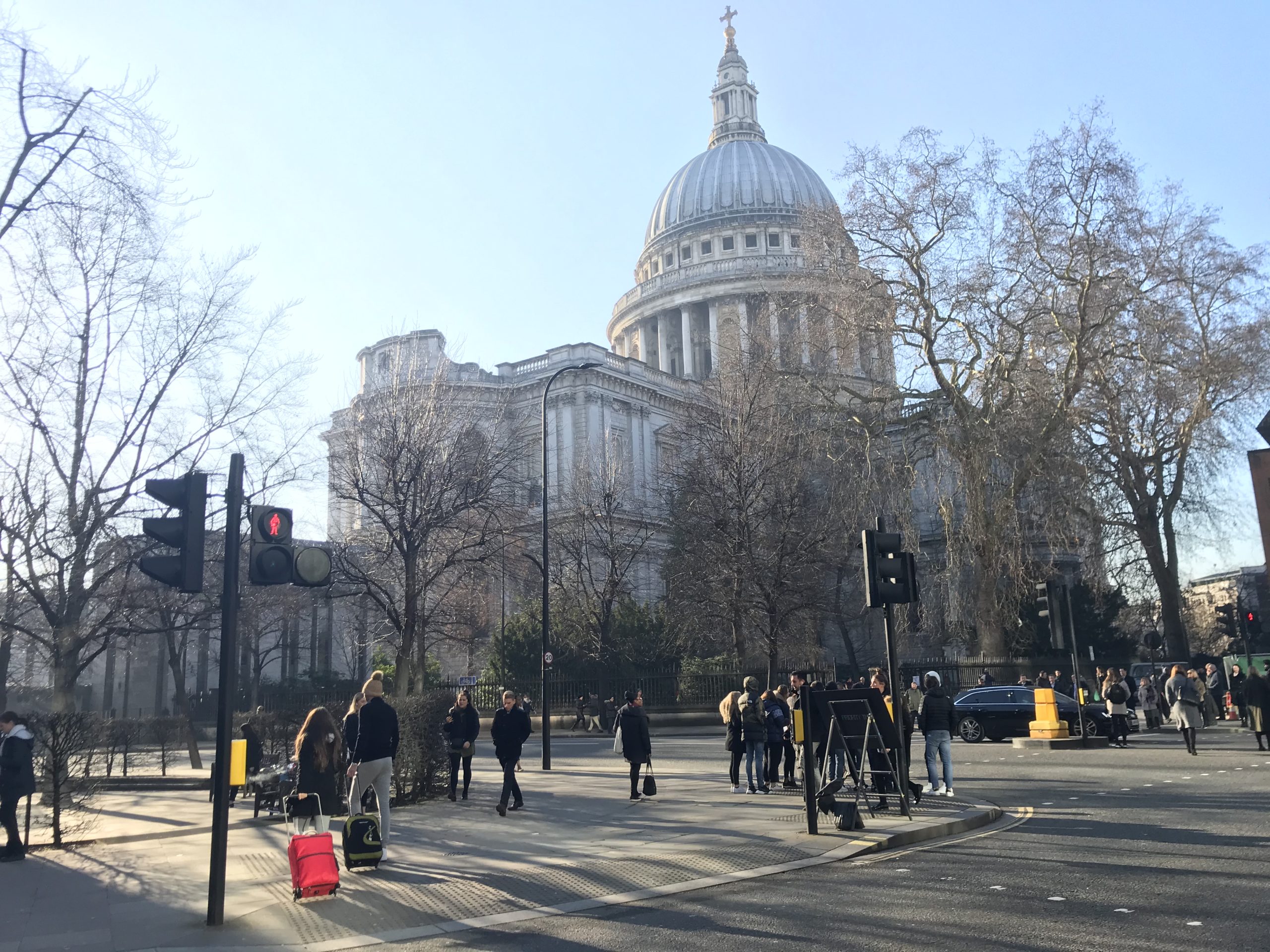 a group of people outside a building