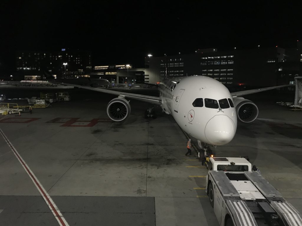 a plane on the tarmac at night