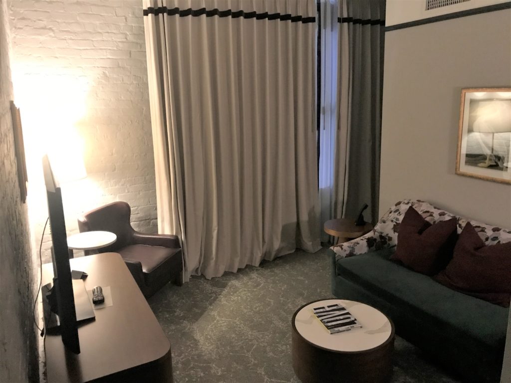 a room with a couch and a tv