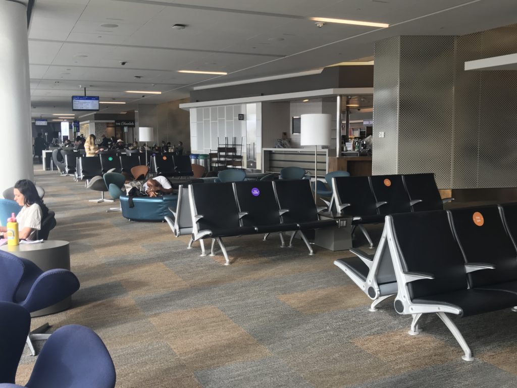 a group of chairs in an airport