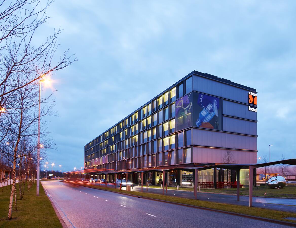 a building with lights on the side of it