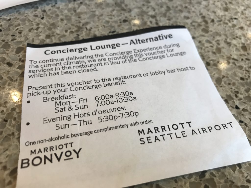 a white and black ticket on a marble surface