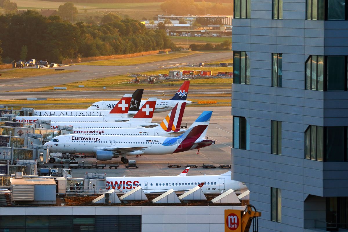 airplanes parked on a runway