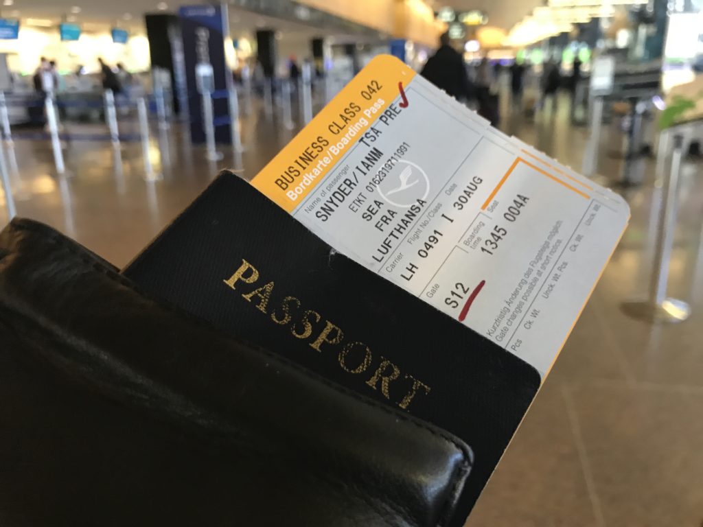 a passport and ticket in a wallet