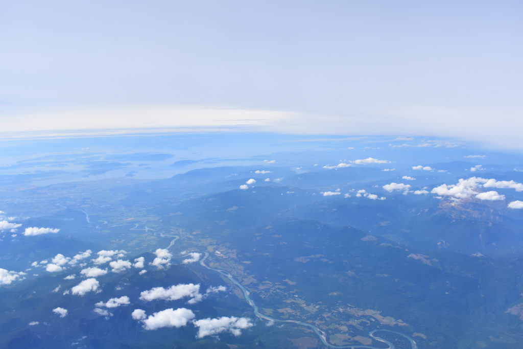 aerial view of a valley and clouds