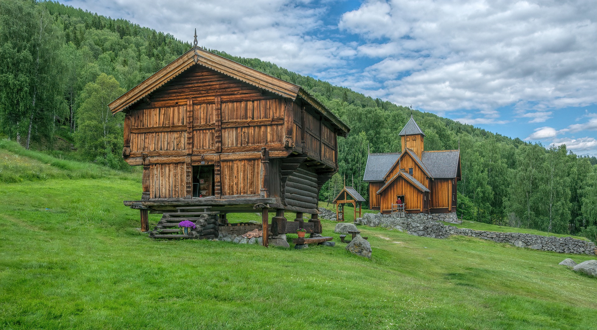 a wooden house on a hill