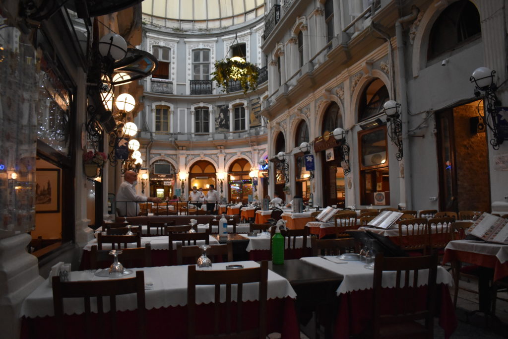 a restaurant with tables and chairs