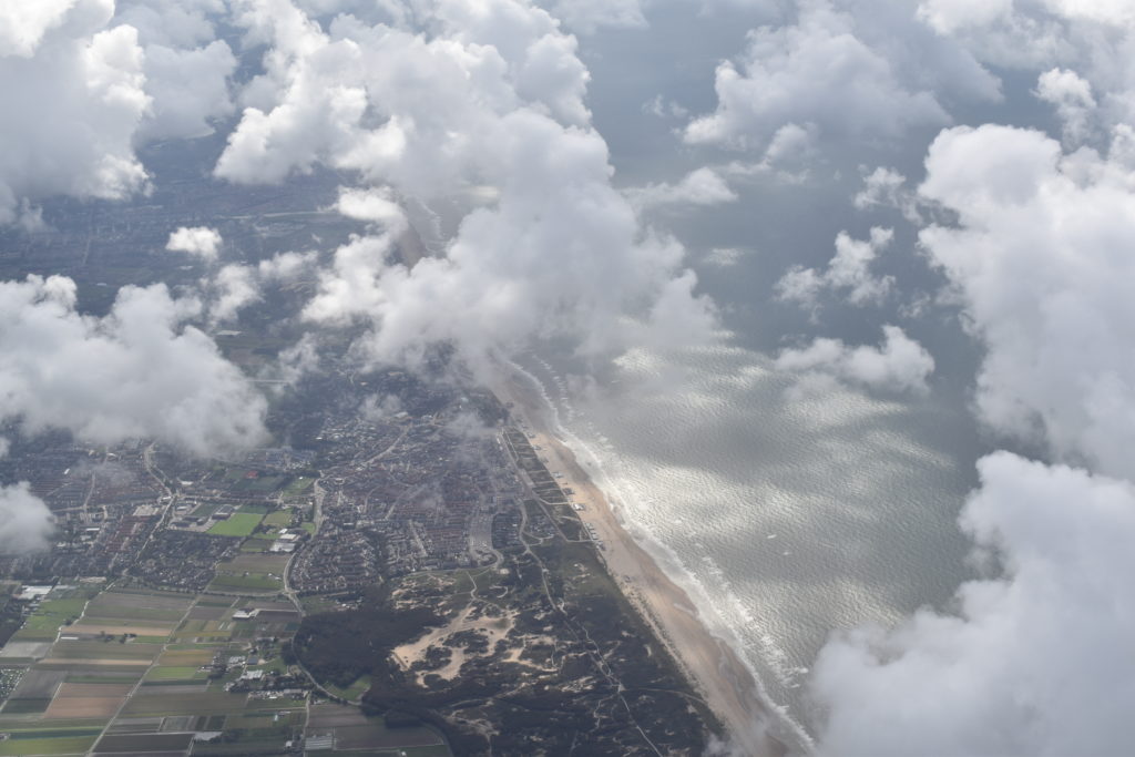 aerial view of a beach and clouds