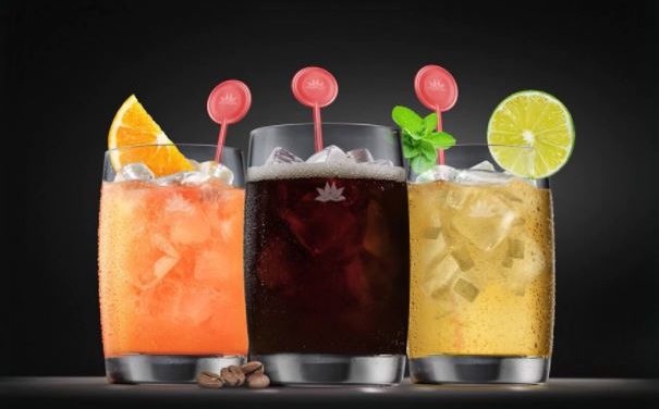 Which airlines offer signature cocktails on board?