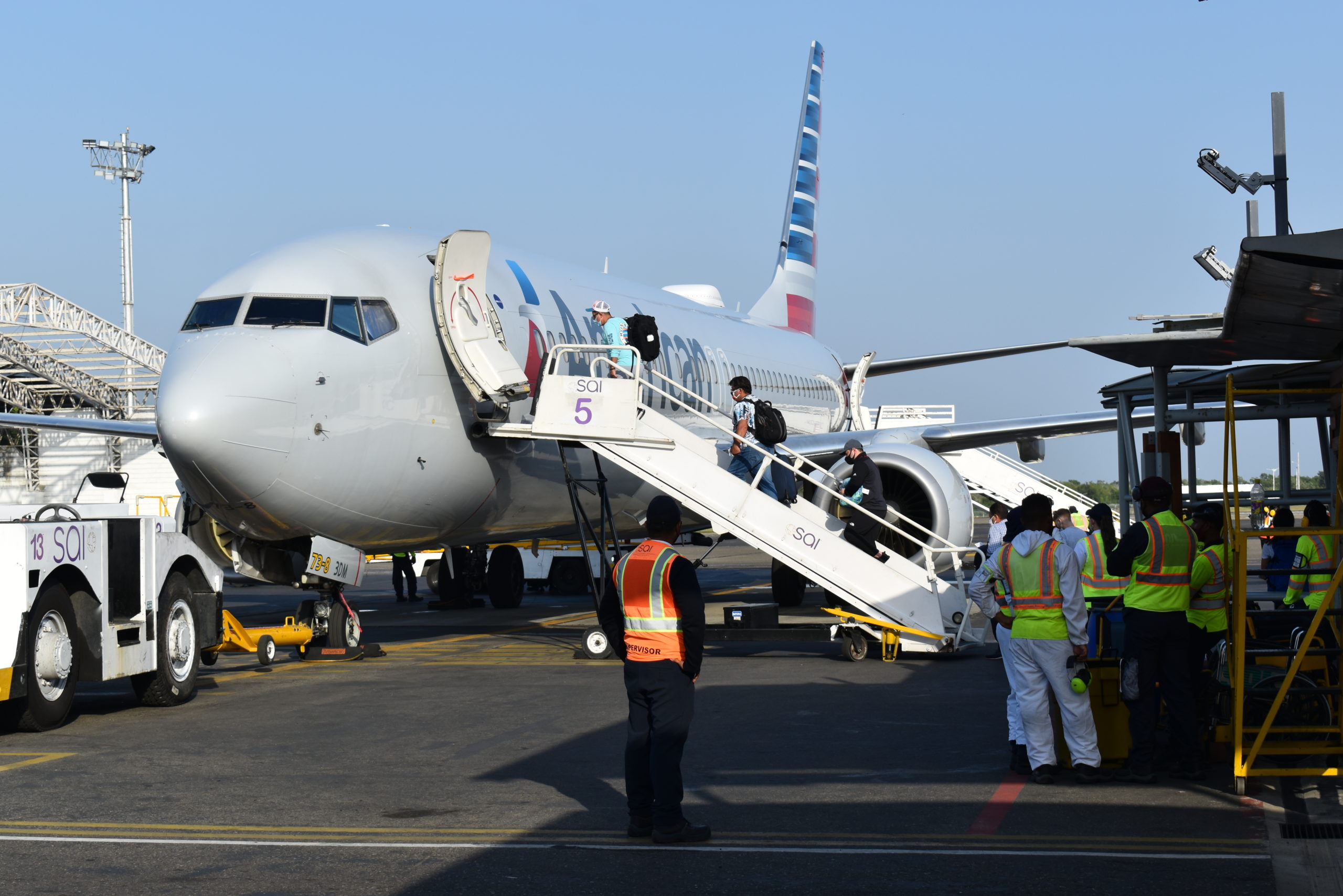 people boarding an airplane