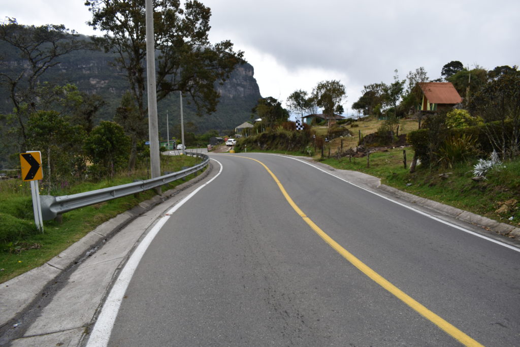 a road with a yellow line on the side