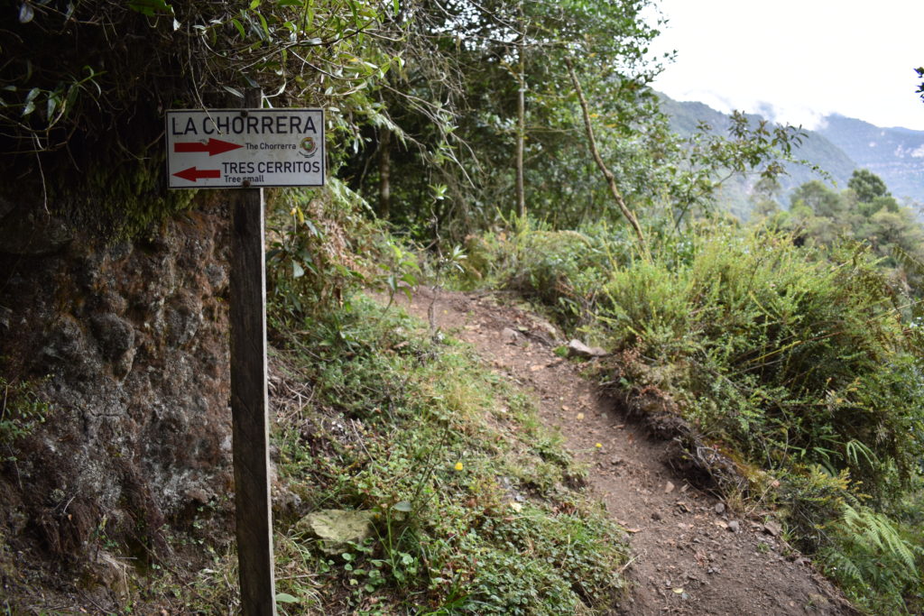 a sign on a trail