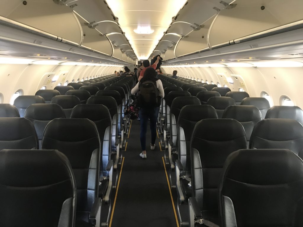 a person walking on an airplane