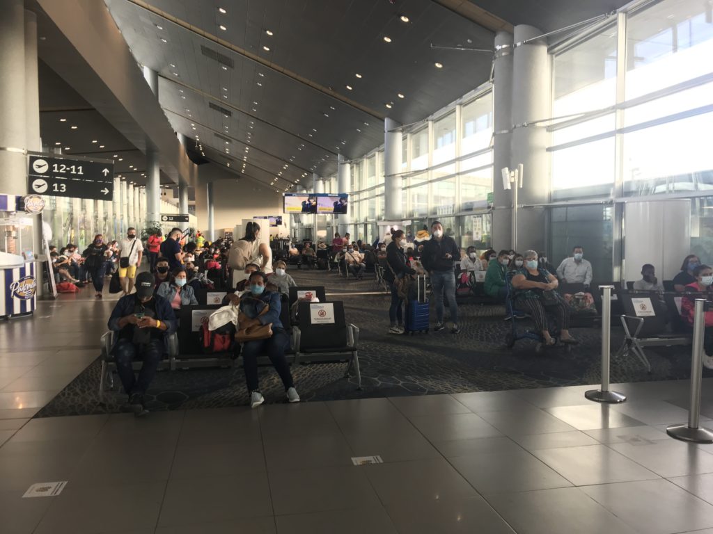 a group of people in a terminal