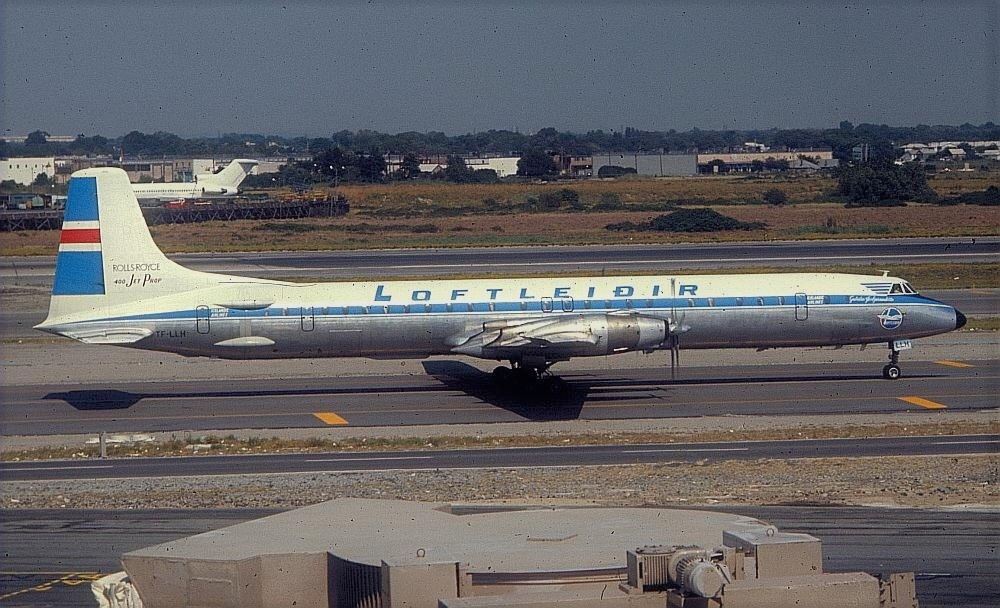 Which was the first aircraft to have enclosed overhead bins in the cabin?