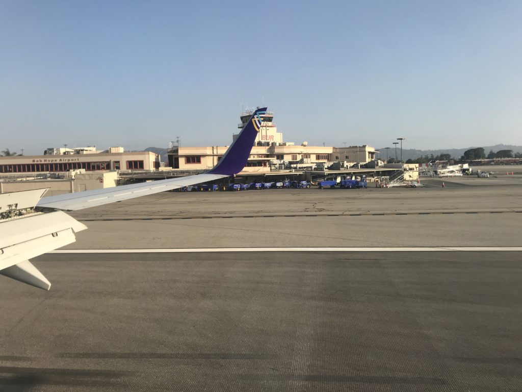 an airplane wing on a runway