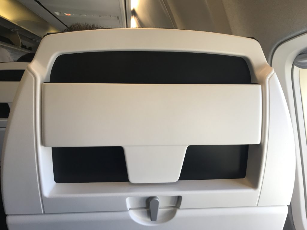 a white and black object on a plane