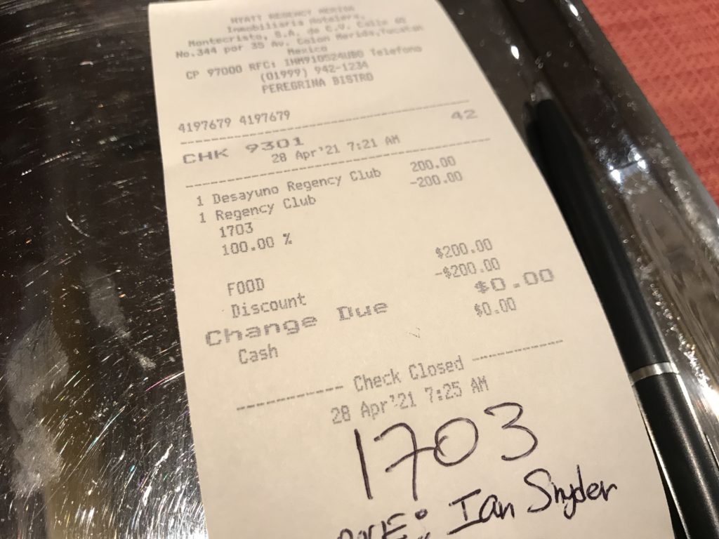 a receipt on a tray