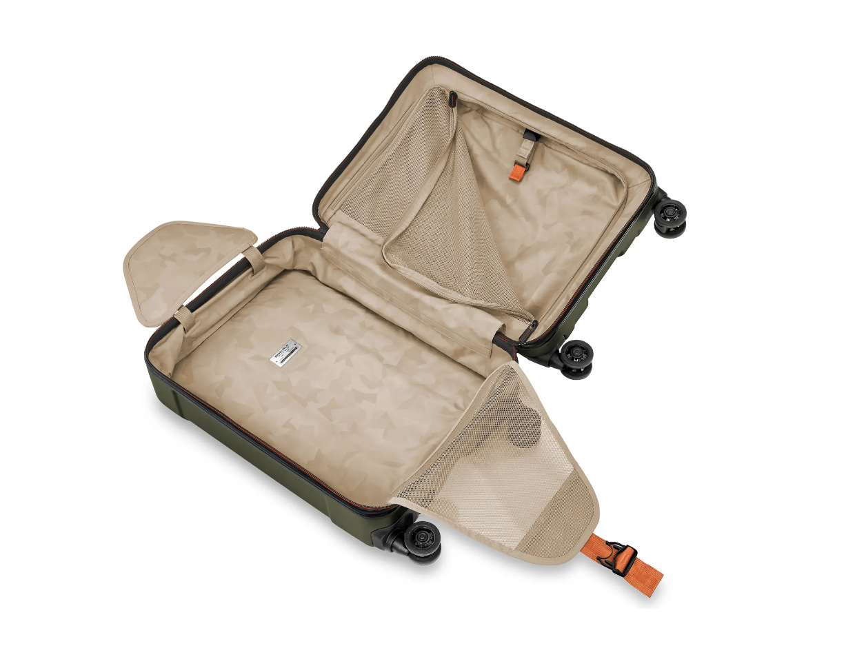 a suitcase with wheels and a mesh inside
