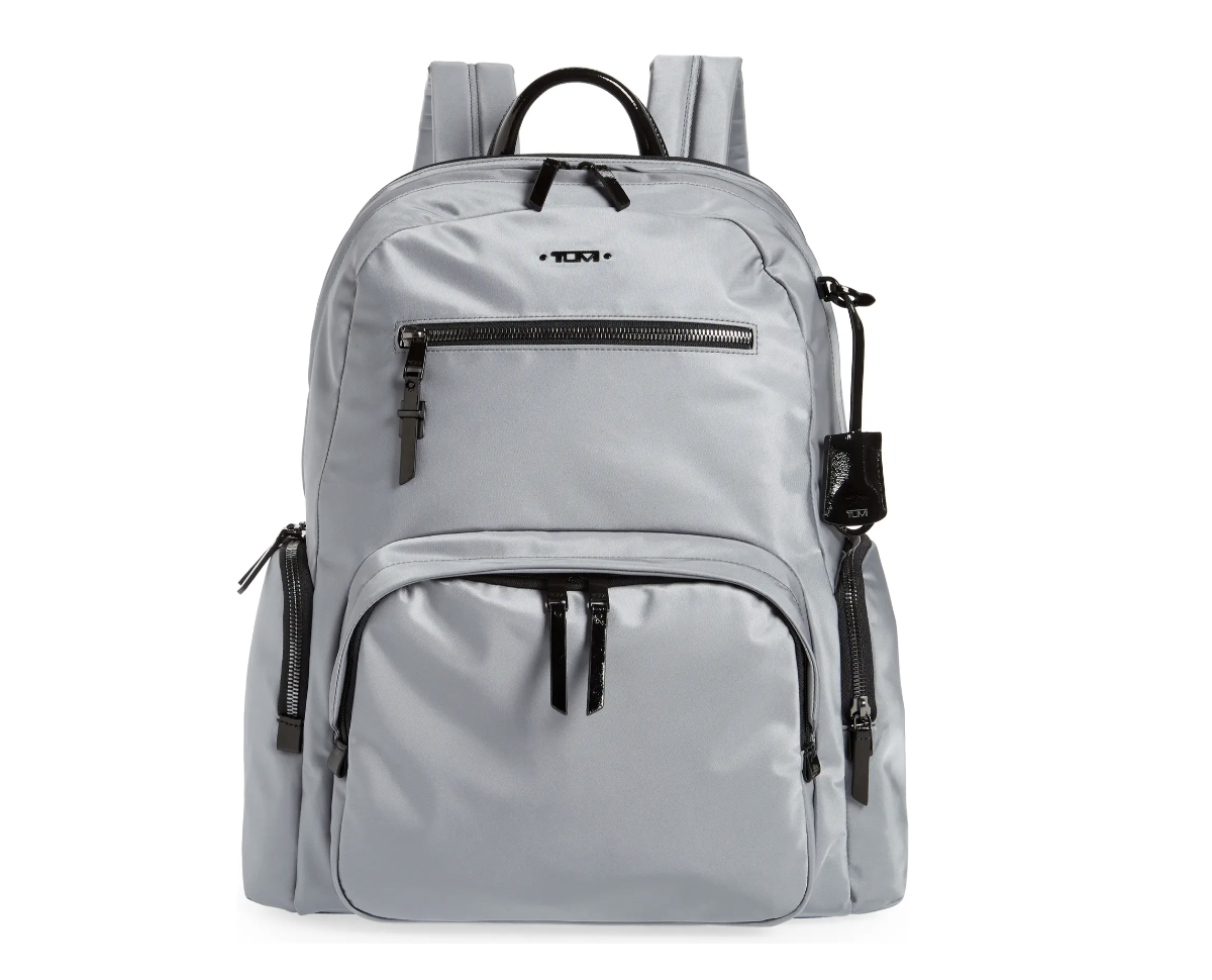 a grey backpack with zippers
