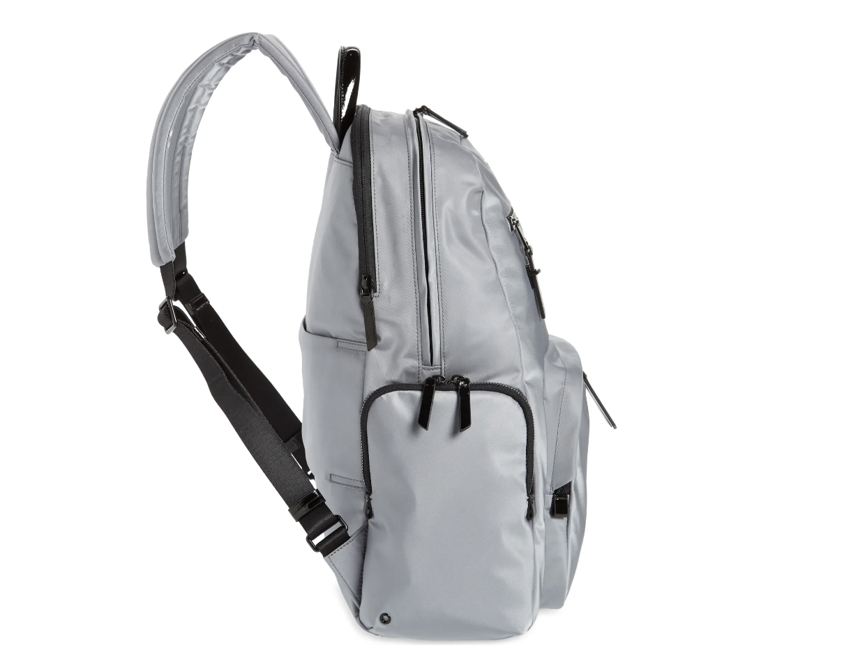 a grey backpack with black straps