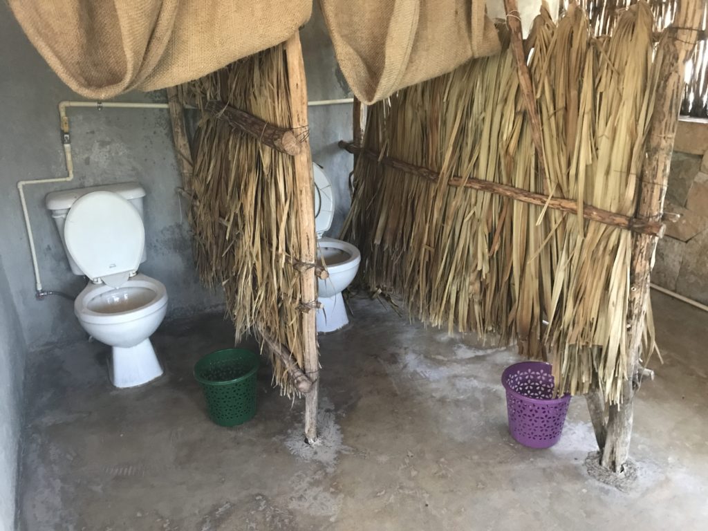 a toilet in a shelter