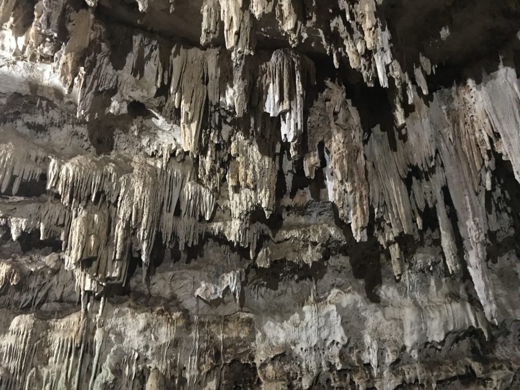 a cave with stalactites and stalagmites