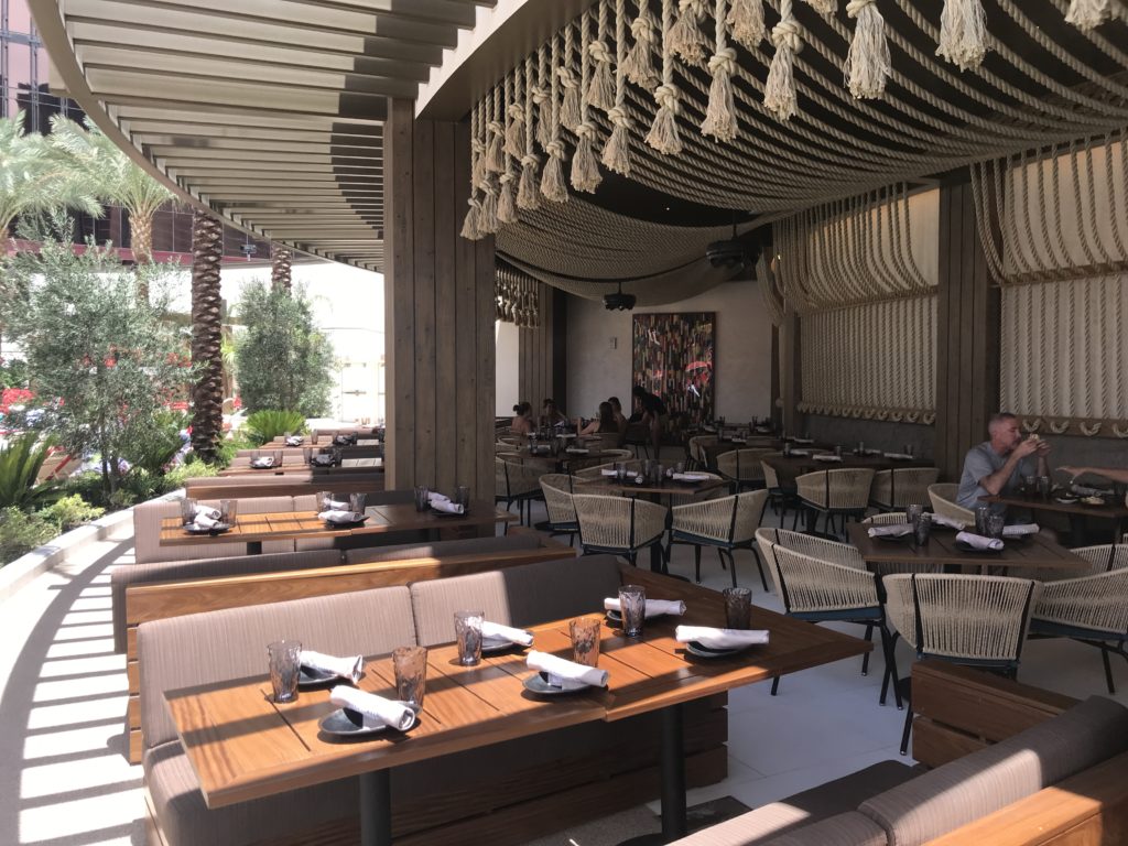 a restaurant with tables and chairs