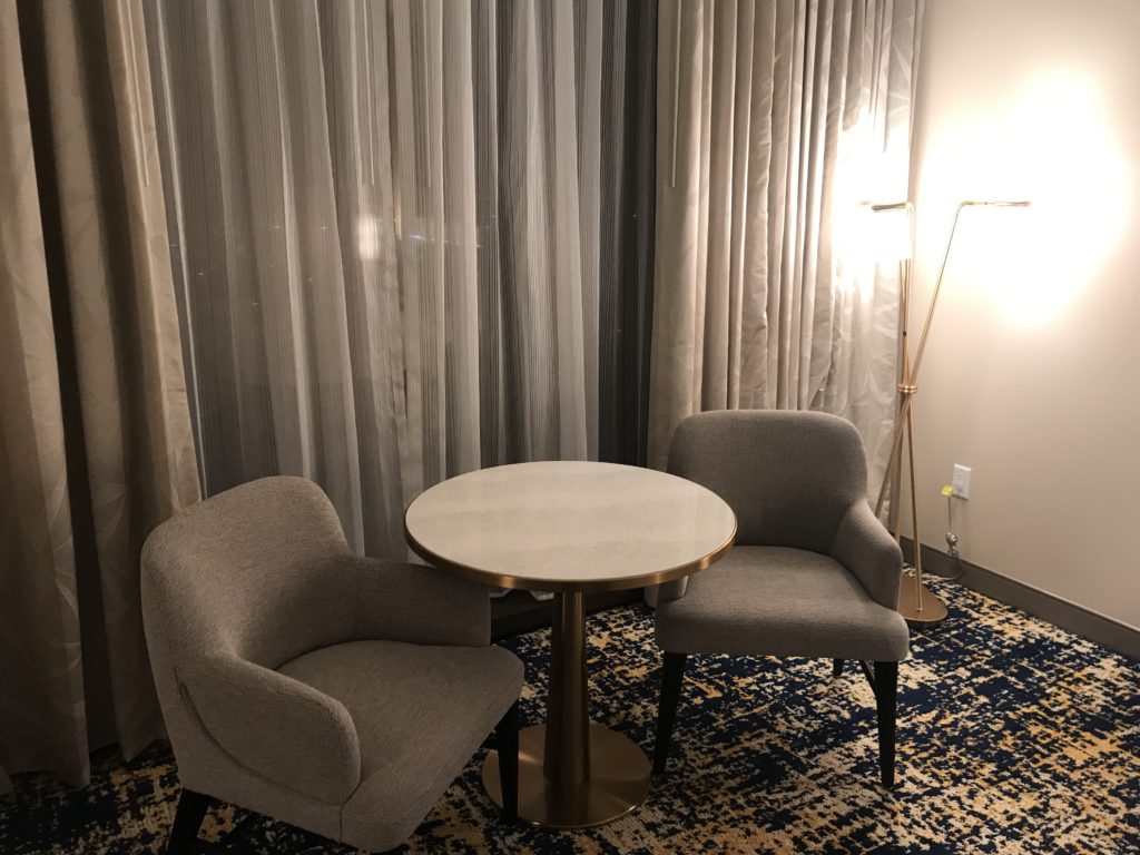 a table and chairs in a room