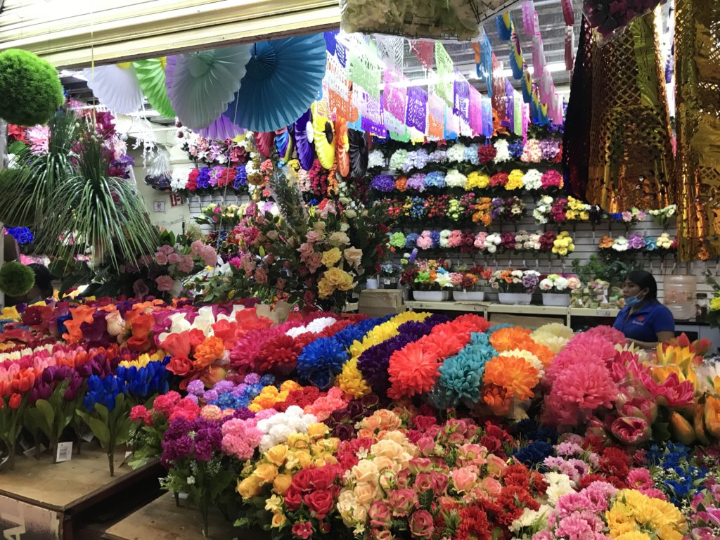 a flower shop with many colorful flowers