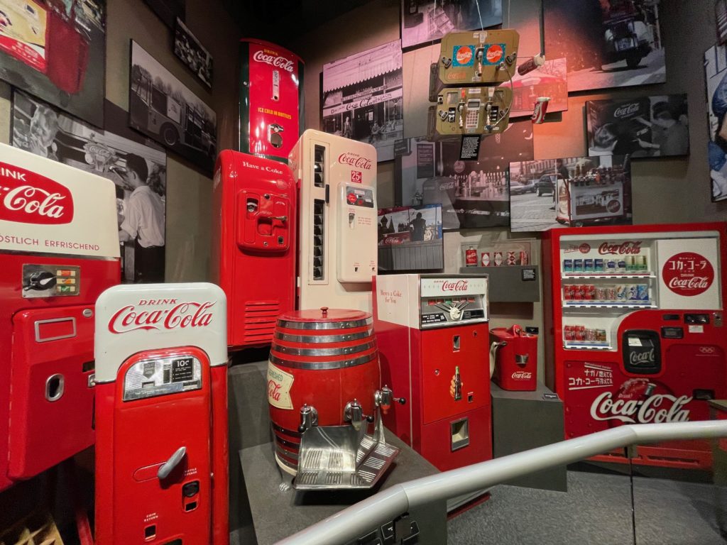 a group of soda machines