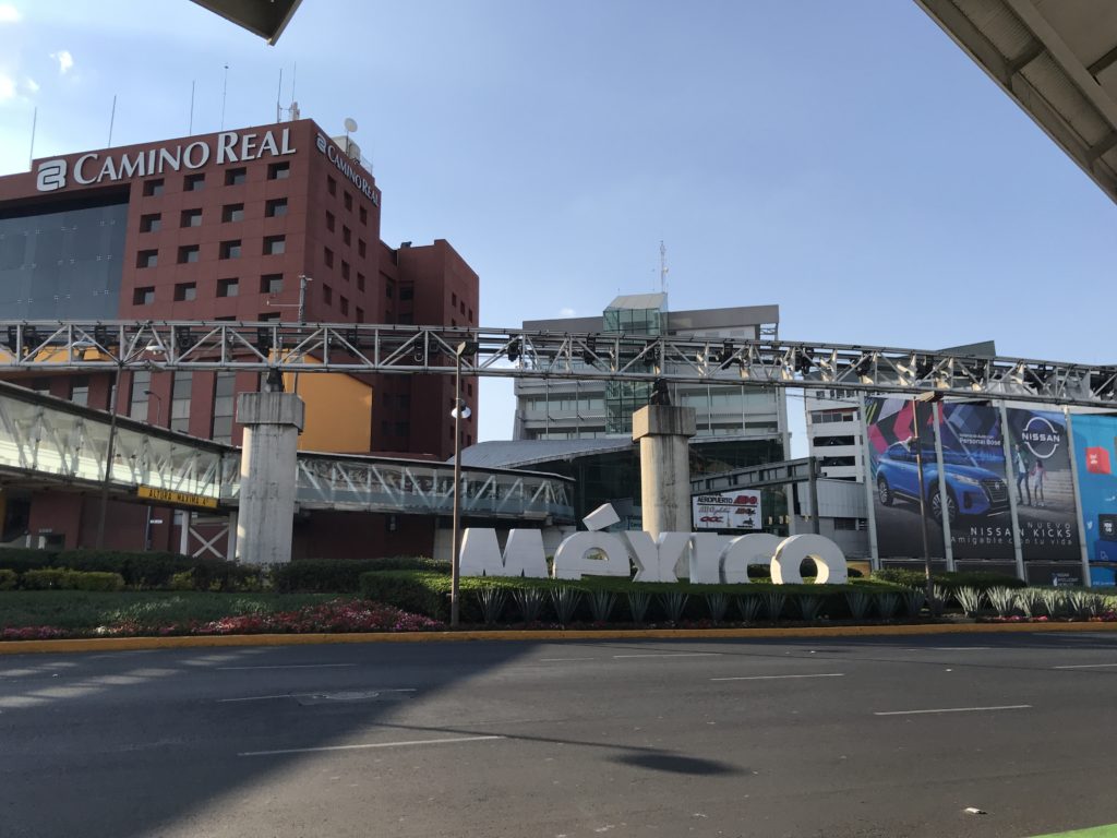 a sign in front of a building