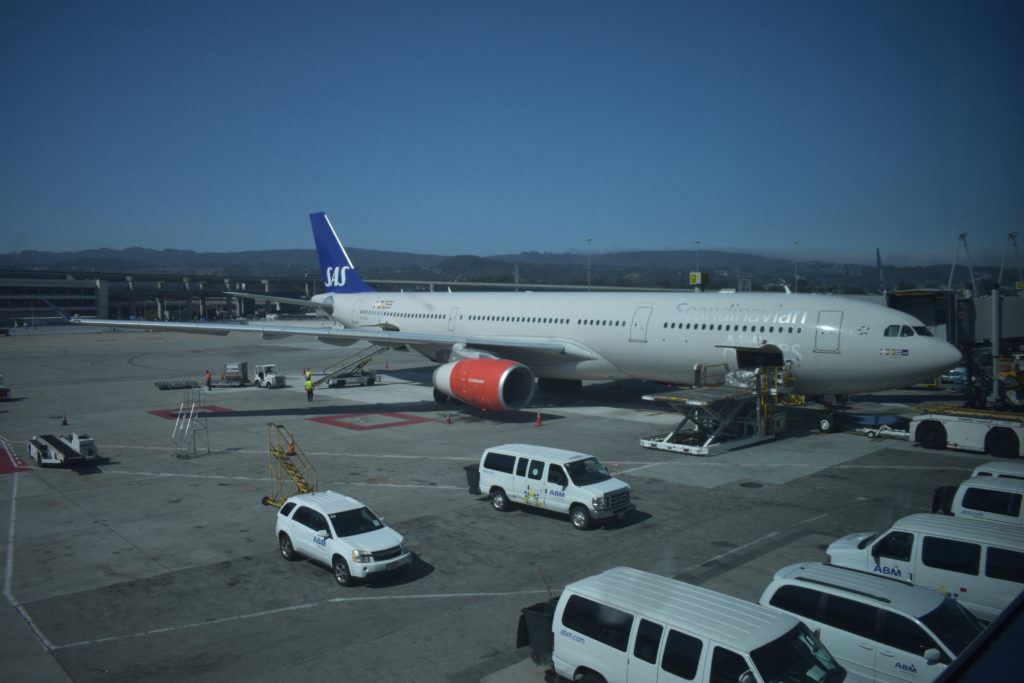 a large white airplane parked on a tarmac