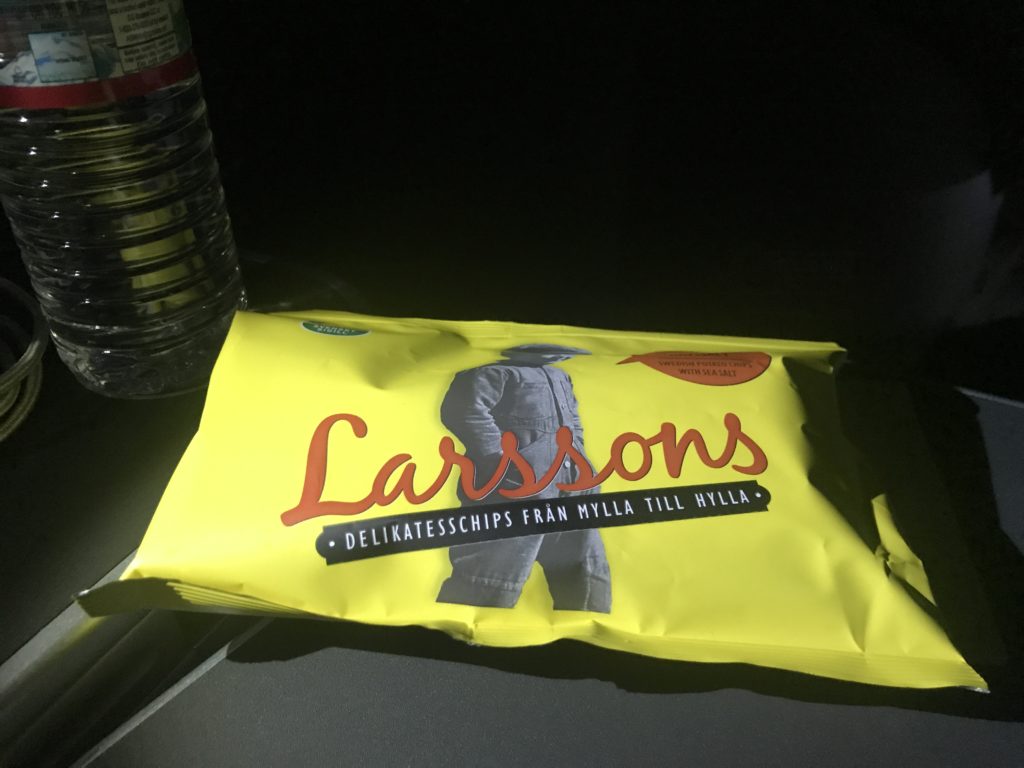 a yellow bag with red text on it