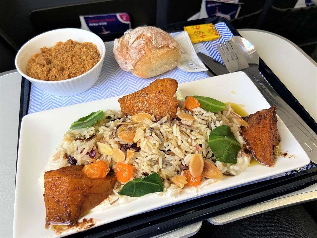 a plate of food on a tray